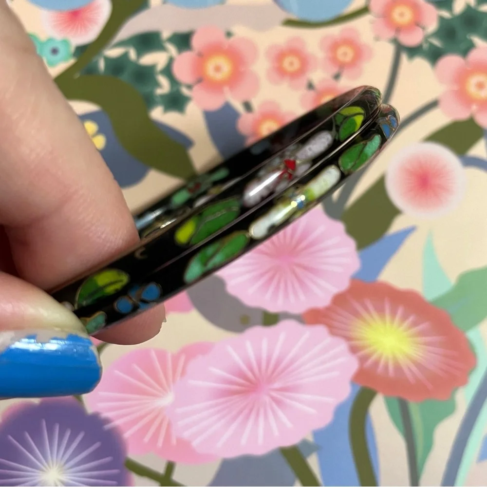 Two vintage cloisonné enamel bangle bracelets black w/ flowers & gold accents